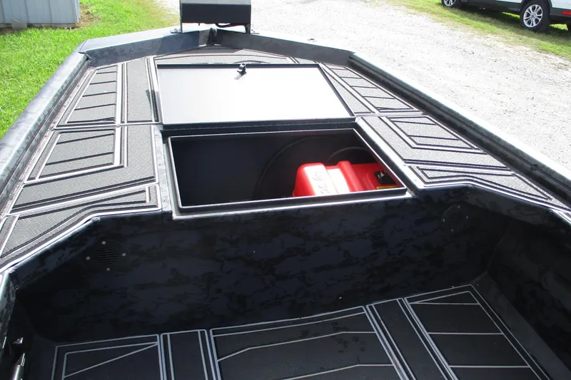 Slide: The Image of 2026 Gator Tail 1854 Extreme boat interior with storage compartment open. - 5