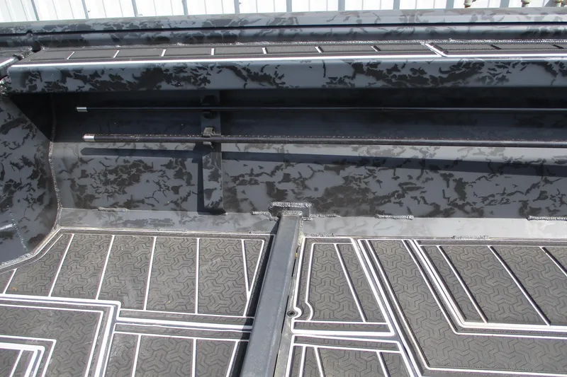 Slide: The Image of Interior view of 2026 Gator Tail 1854 Extreme boat with patterned flooring. - 8