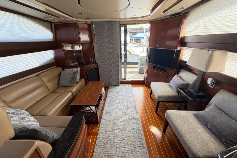 Slide: The Image of Luxurious interior of a 2009 Meridian 441 Sedan yacht with elegant furnishings and modern decor. - 14