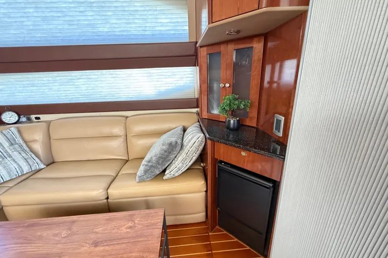 Slide: The Image of Luxurious interior of 2009 Meridian 441 Sedan with leather seating and elegant wood cabinetry. - 15