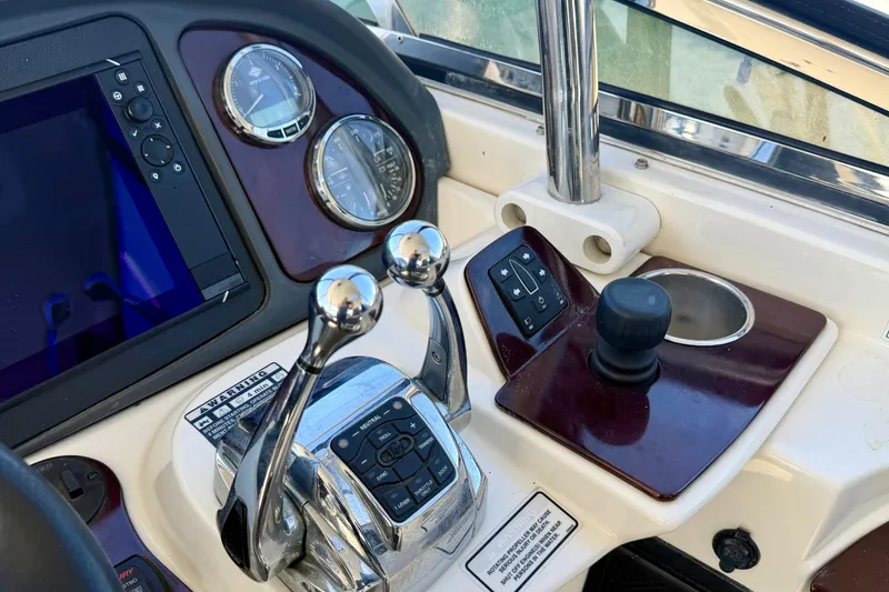 Slide: The Image of Control panel of a 2009 Meridian 441 Sedan yacht with navigation instruments. - 19