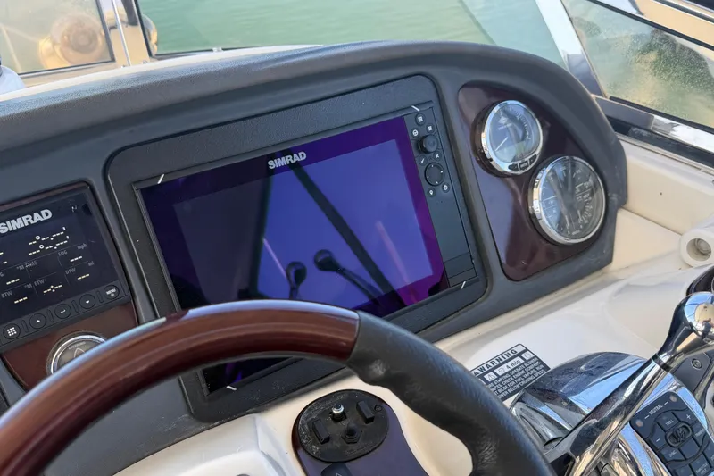 Slide: The Image of Dashboard of a 2009 Meridian 441 Sedan with Simrad navigation system and gauges. - 20