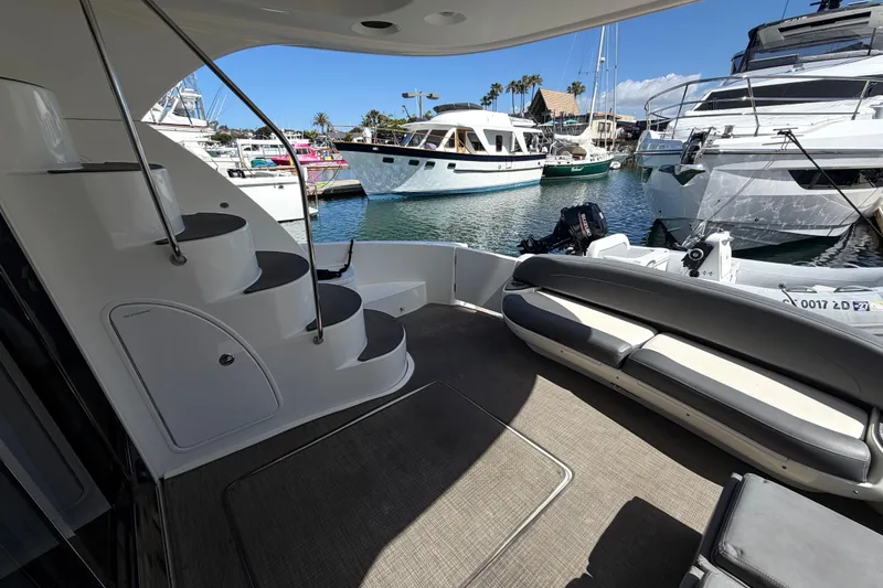 Slide: The Image of 2009 Meridian 441 Sedan yacht interior with staircase and marina view. - 31