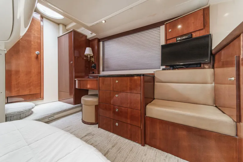 Slide: The Image of Luxurious interior of 2009 Meridian 441 Sedan yacht with wood cabinetry and seating. - 37