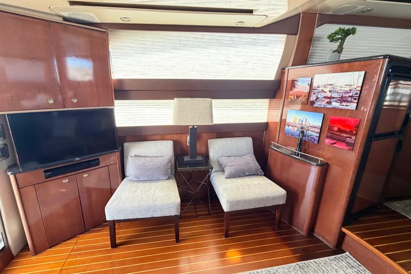 Slide: The Image of Luxurious interior of a 2009 Meridian 441 Sedan yacht with elegant seating and decor. - 4