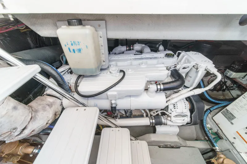 Slide: The Image of Engine compartment of a 2009 Meridian 441 Sedan yacht, showcasing mechanical components. - 40