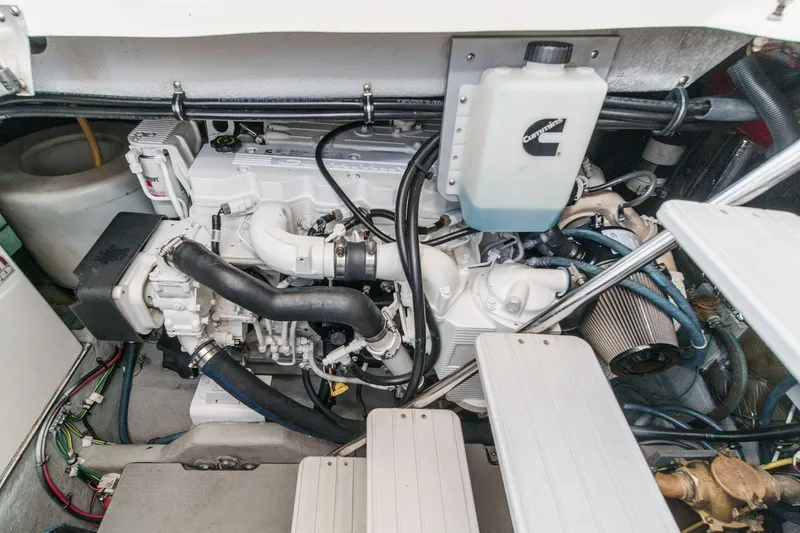 Slide: The Image of Engine compartment of a 2009 Meridian 441 Sedan, featuring Cummins components and detailed wiring. - 41