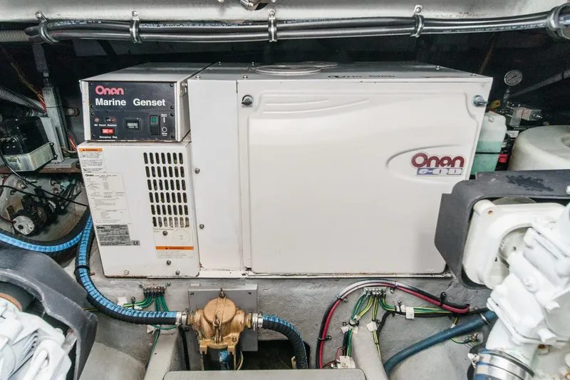 Slide: The Image of Engine room of 2009 Meridian 441 Sedan with Onan marine generator. - 42