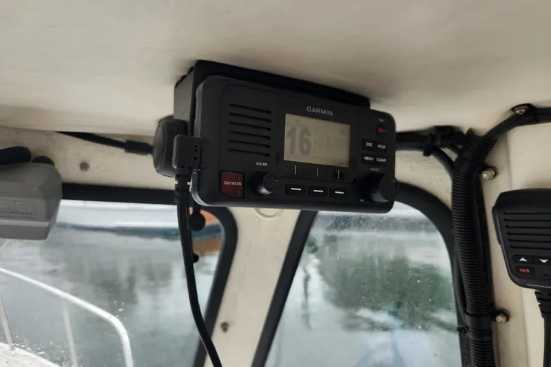Slide: The Image of Garmin marine radio installed in 2018 Atlas Acadia boat cabin. - 4