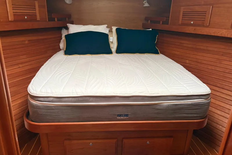 Slide: The Image of Cozy cabin bed in 2020 Sabre 42 Salon Express yacht with wooden interior. - 12