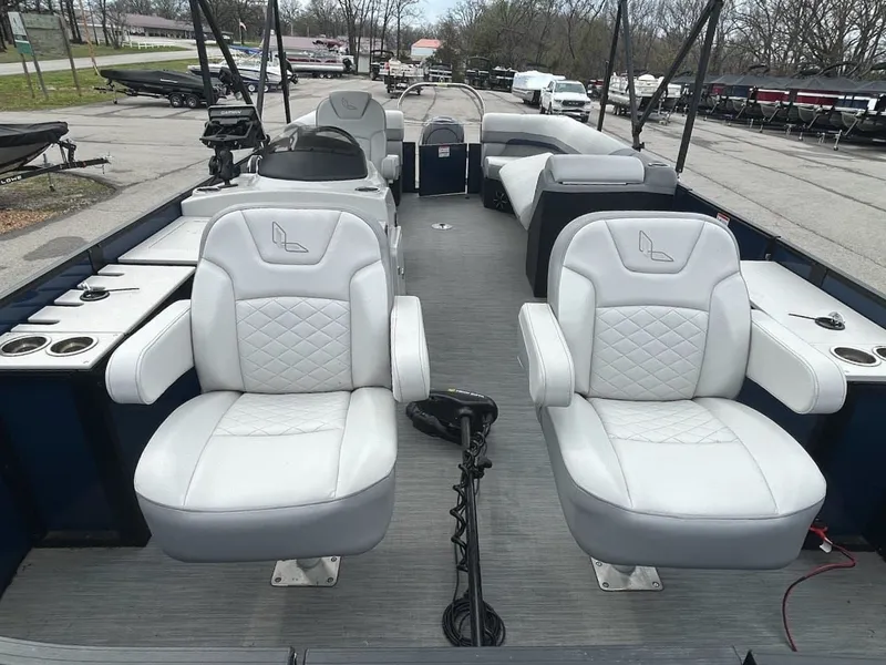 Slide: The Image of Interior of a 2024 Lowe SS214 pontoon boat with luxurious seating. - 13