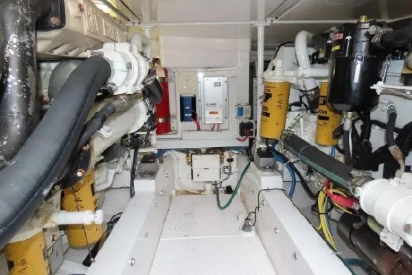Slide: The Image of Engine room of 2011 Henriques 42 Flybridge with visible machinery and components. - 26