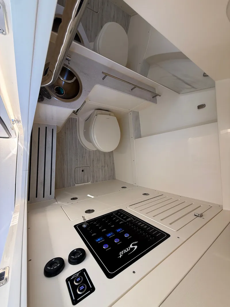 Slide: The Image of Interior of 2026 Scout 288 LXF featuring toilet and sink. - 11