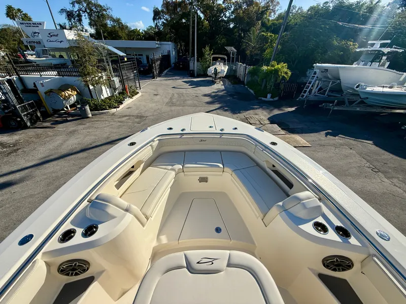 Slide: The Image of Interior view of 2026 Scout 288 LXF boat at dock. - 4