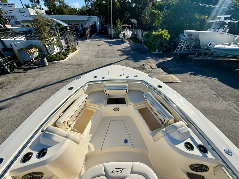 Slide: The Image of Scout 288 LXF 2026 boat with luxurious interior and seating area. - 5