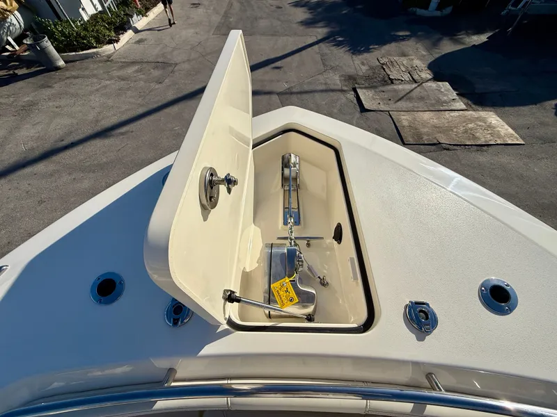 Slide: The Image of Scout 288 LXF 2026 anchor compartment on boat deck. - 6