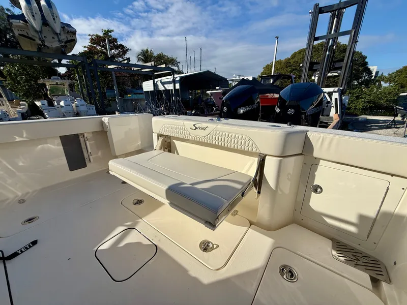 Slide: The Image of Scout 288 LXF 2026 with foldable seat and engines in the background. - 8