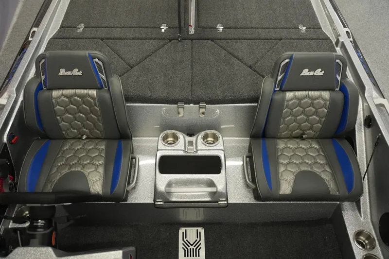 Slide: The Image of 2026 Bass Cat Lynx STS interior with dual seats and center console. - 15