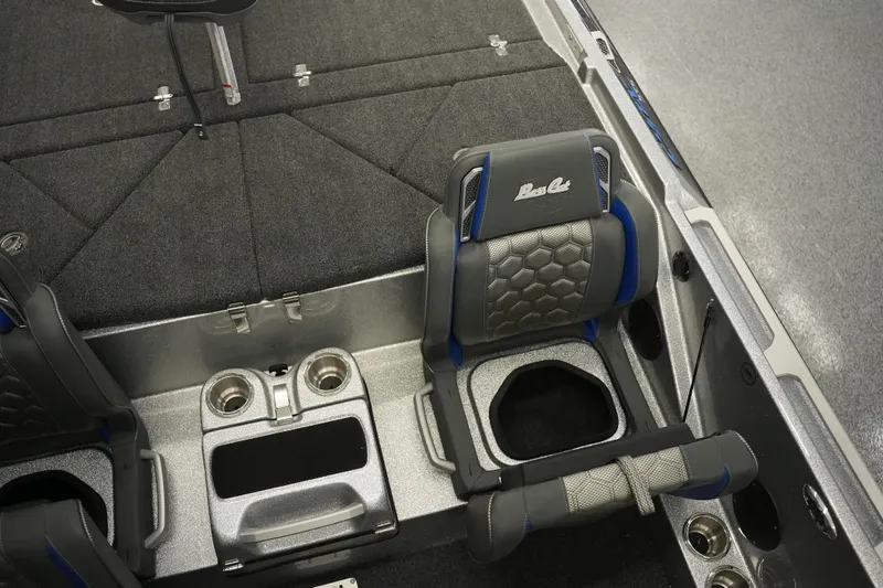 Slide: The Image of Interior of 2026 Bass Cat Lynx STS boat with stylish seating and cup holders. - 23