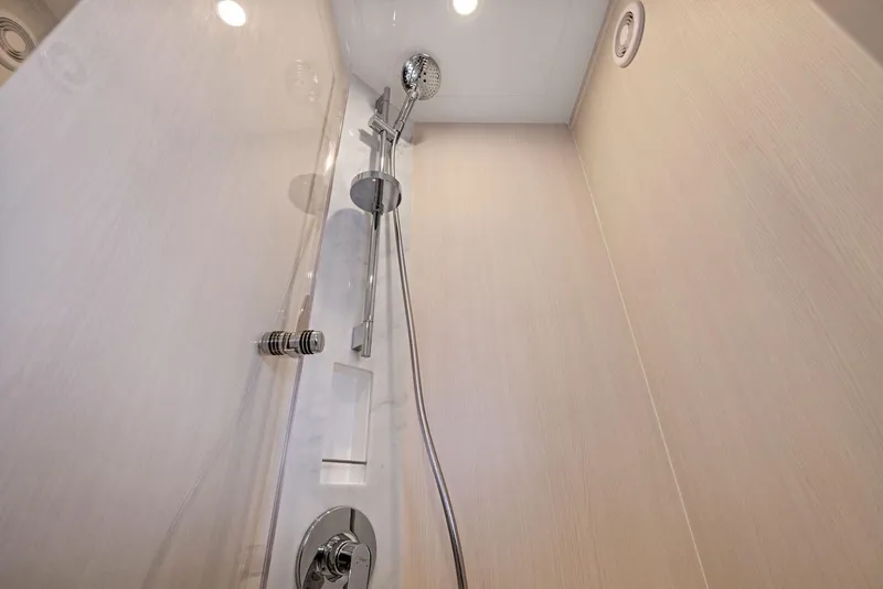 Slide: The Image of Luxurious shower in 2024 Fairline Phantom 65 yacht, featuring modern fixtures and elegant design. - 22