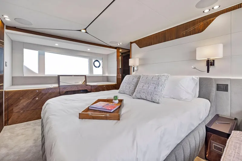 Slide: The Image of Luxurious bedroom interior of 2024 Fairline Phantom 65 yacht with modern design elements. - 35