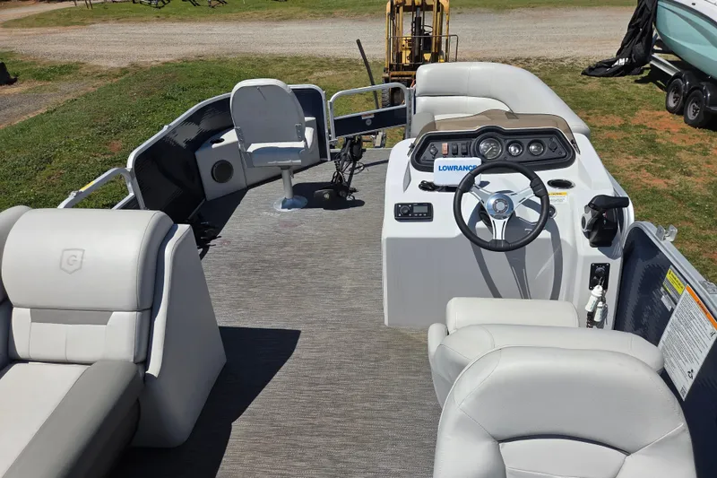 Slide: The Image of 2021 Godfrey Sweetwater 1880 FX boat interior with steering console and seating. - 13