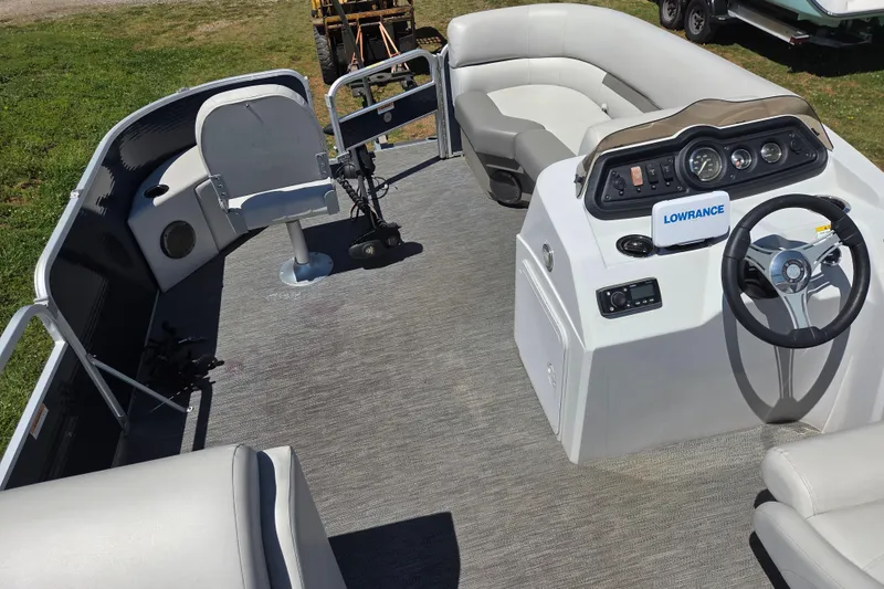 Slide: The Image of 2021 Godfrey Sweetwater 1880 FX pontoon boat interior with steering console and seating. - 7
