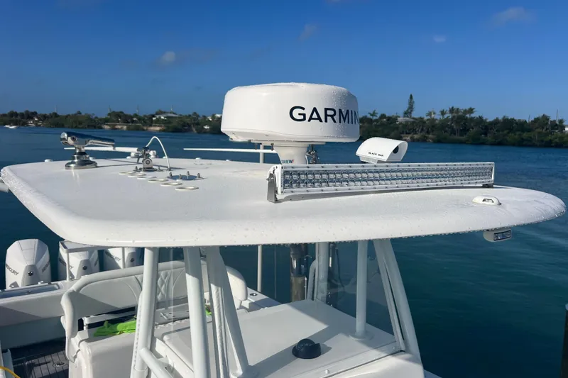 Slide: The Image of 2024 Contender 35 ST boat with Garmin radar and Black Oak light bar. - 15