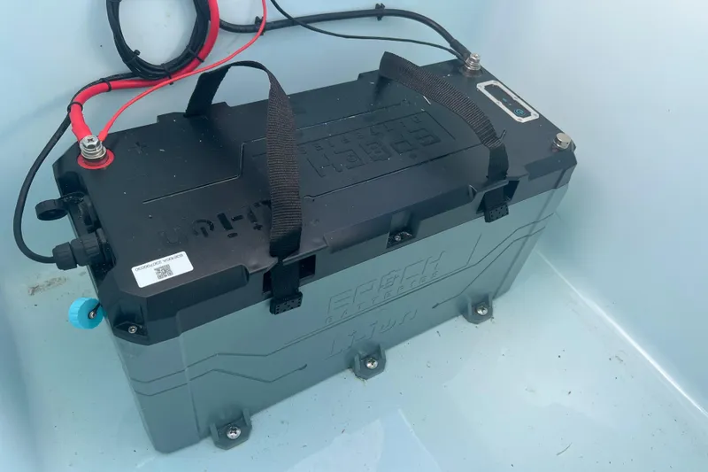 Slide: The Image of Battery installed in a 2024 Contender 35 ST boat, featuring secure wiring and durable design. - 22