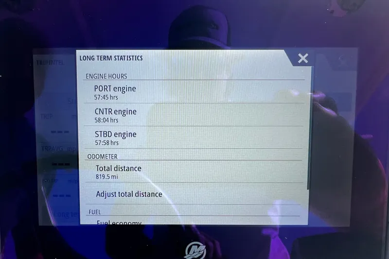 Slide: The Image of Display screen showing engine hours and odometer statistics for 2024 Contender 35 ST. - 29
