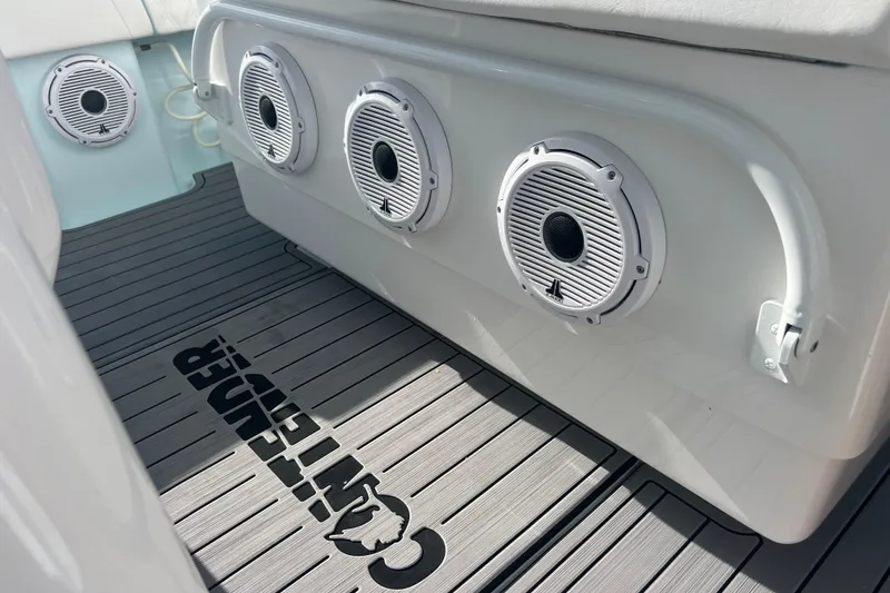 Slide: The Image of 2024 Contender 35 ST boat interior with speakers and branded flooring. - 30