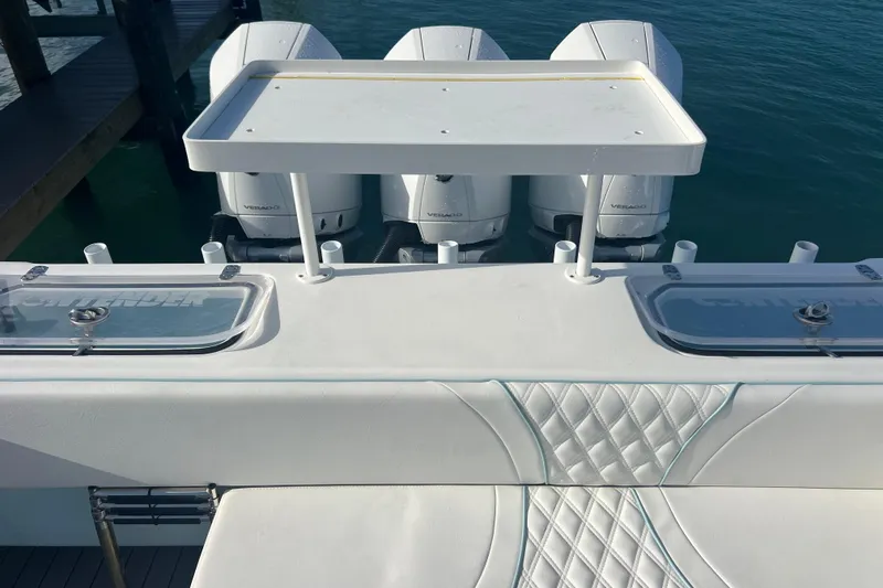 Slide: The Image of 2024 Contender 35 ST boat with quad engines and fishing station. - 7