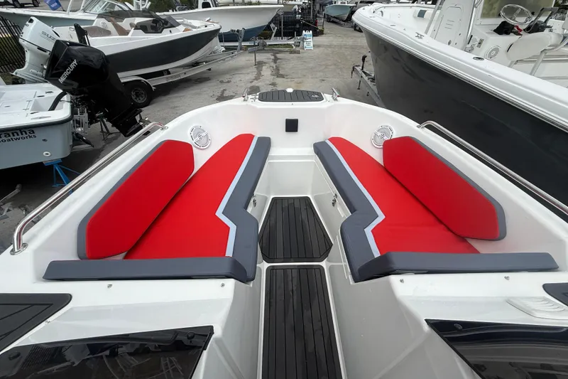 Slide: The Image of Red and gray seating on a 2025 Custom DW DESIGN 570BR boat deck. - 8