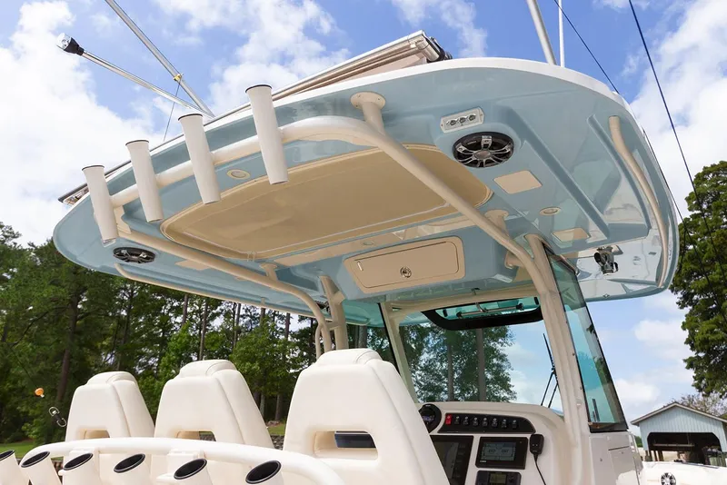 Slide: The Image of Manufacturer Provided Image: 2021 Grady-White Canyon 336 boat interior with seating and overhead rod holders. - 6