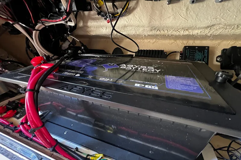 Slide: The Image of Battery setup in a 2021 Grady-White Canyon 336 boat, featuring Abyss Battery. - 68