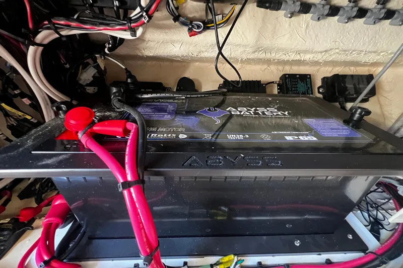 Slide: The Image of Battery setup in a 2021 Grady-White Canyon 336 boat, featuring Abyss Battery. - 69