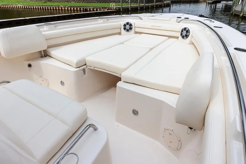 Slide: The Image of Manufacturer Provided Image: 2021 Grady-White Canyon 336 boat with spacious seating and white upholstery. - 8