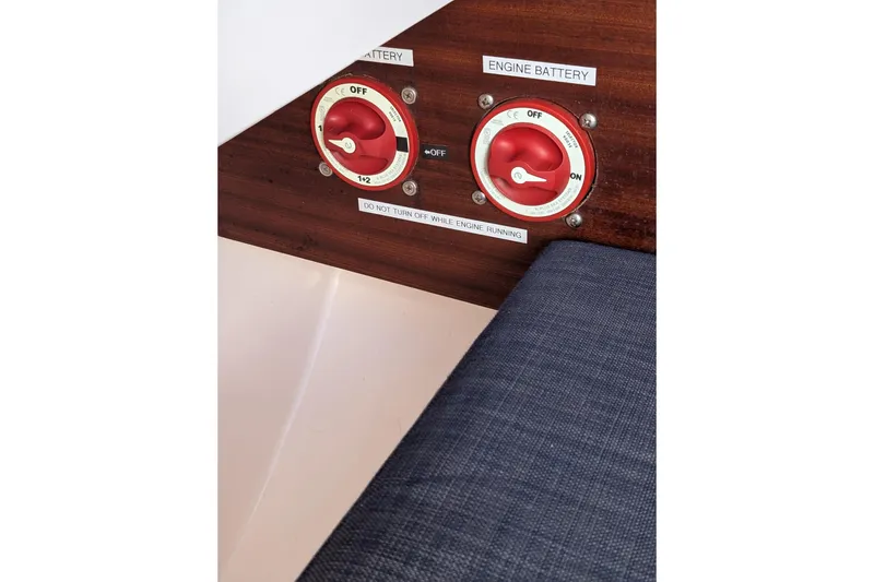 Slide: The Image of Red battery switches on 2018 J Boats J/121 yacht interior panel. - 45