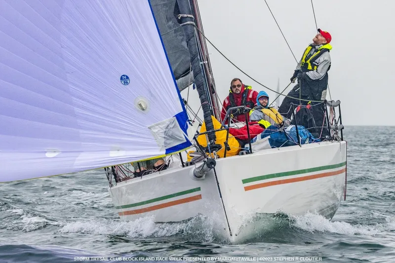 Slide: The Image of Sailing crew on 2018 J Boats J/121 during a race, navigating choppy waters. - 4
