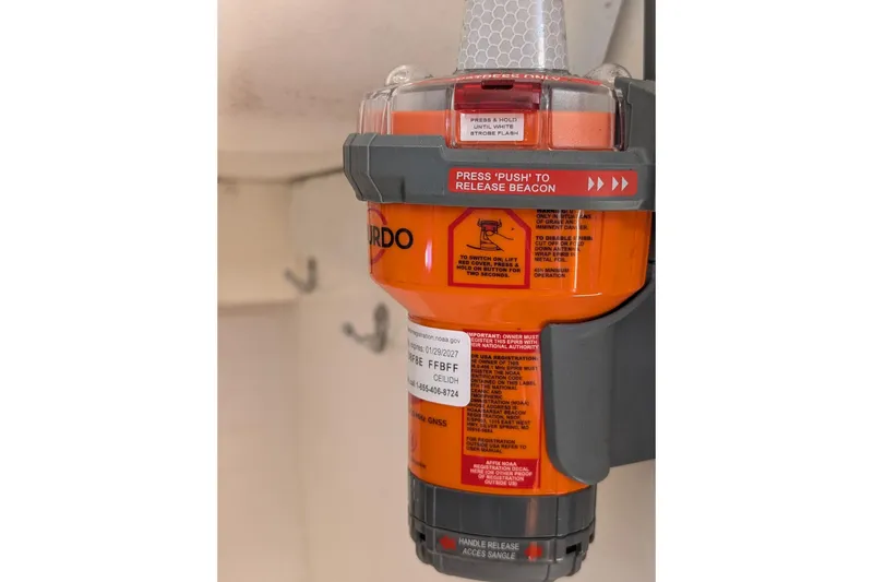 Slide: The Image of Emergency beacon on a 2018 J Boats J/121 sailboat, mounted for safety. - 46