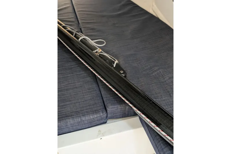 Slide: The Image of Interior view of 2018 J Boats J/121 sailboat with ropes and cushions. - 30