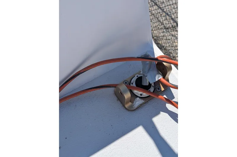 Slide: The Image of Close-up of wiring on a 2018 J Boats J/121 sailboat deck. - 57