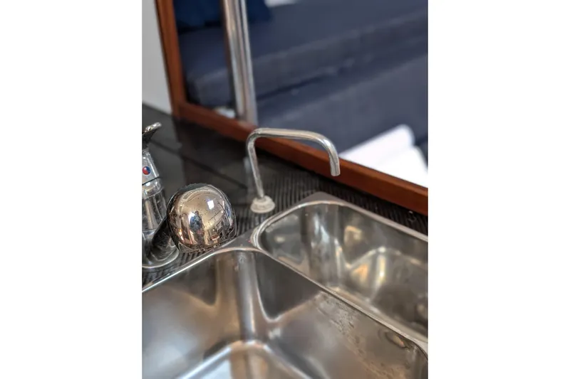 Slide: The Image of Stainless steel sink and faucet in 2018 J Boats J/121 yacht interior. - 38