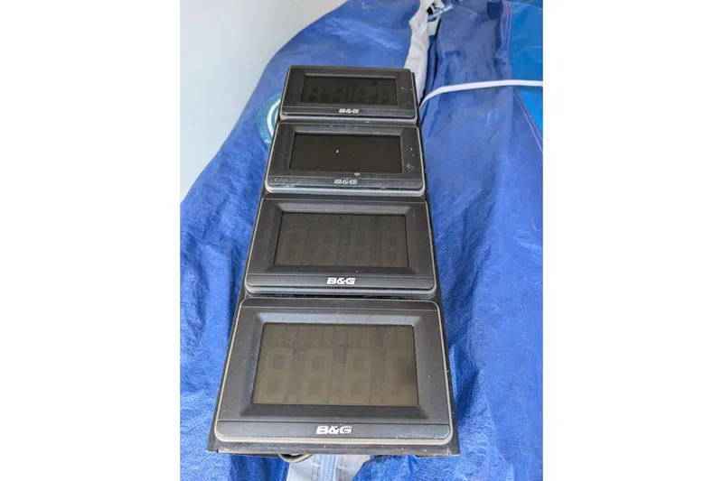 Slide: The Image of B&G marine displays on a 2018 J Boats J/121, resting on a blue tarp. - 25