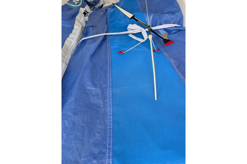 Slide: The Image of Blue sail and wind vane from a 2018 J Boats J/121 yacht. - 27