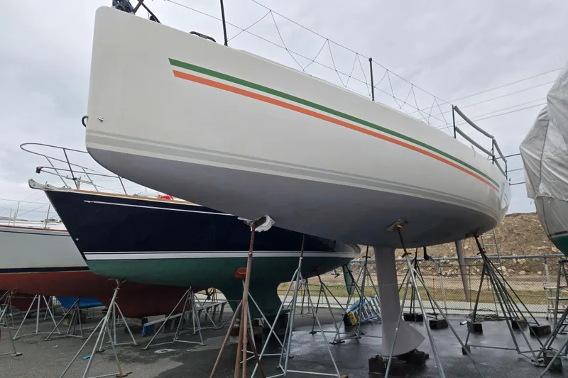 Slide: The Image of 2018 J Boats J/121 sailboat on stands, featuring sleek hull design. - 66