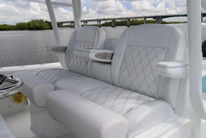 Slide: The Image of Luxury seating on 2020 Yellowfin 39 Offshore boat with scenic river view. - 23