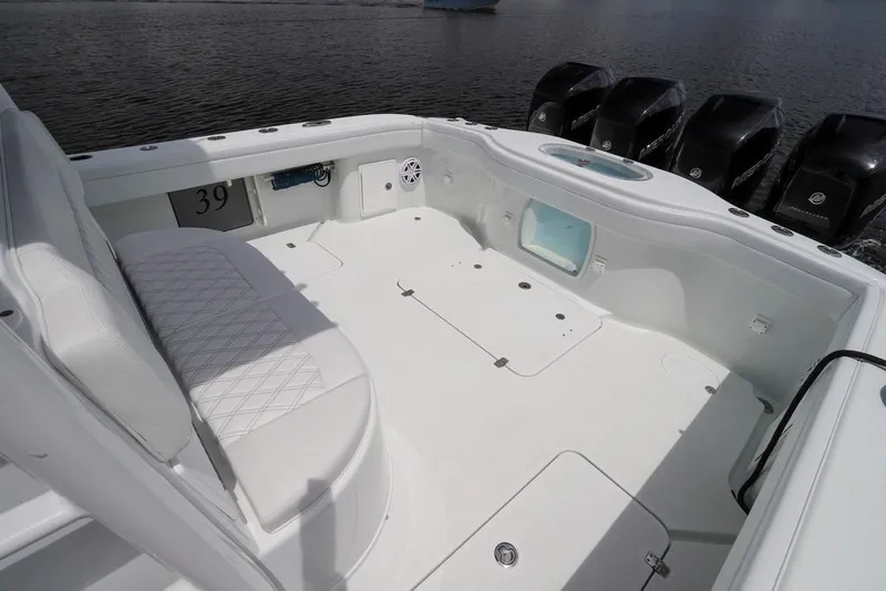 Slide: The Image of 2020 Yellowfin 39 Offshore boat interior with seating and multiple outboard engines. - 28