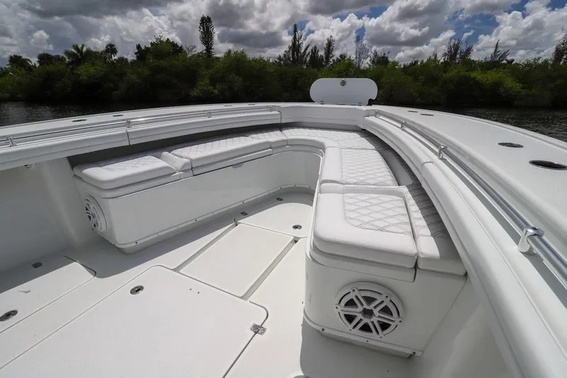 Slide: The Image of 2020 Yellowfin 39 Offshore boat with spacious white seating and sleek design. - 34