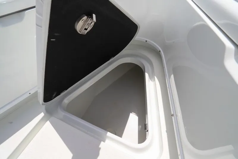 Slide: The Image of Open storage compartment on a 2020 Yellowfin 39 Offshore boat. - 35